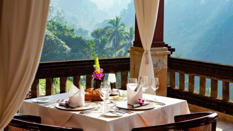hotels in heaven viceroy bali breakfast view rain forest nature culinary bread table wine glass flower plant palm trees