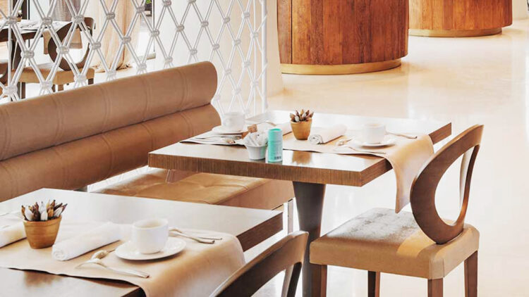 hotels in heaven aguas de ibiza culinary breakfast glass sofa chairs vase table sofa couch brown yellowish