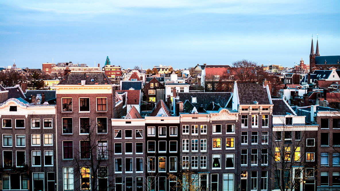 hotels in heaven the dylan amsterdam location view skyline windows houses city sky foggy morning sunrise roofs