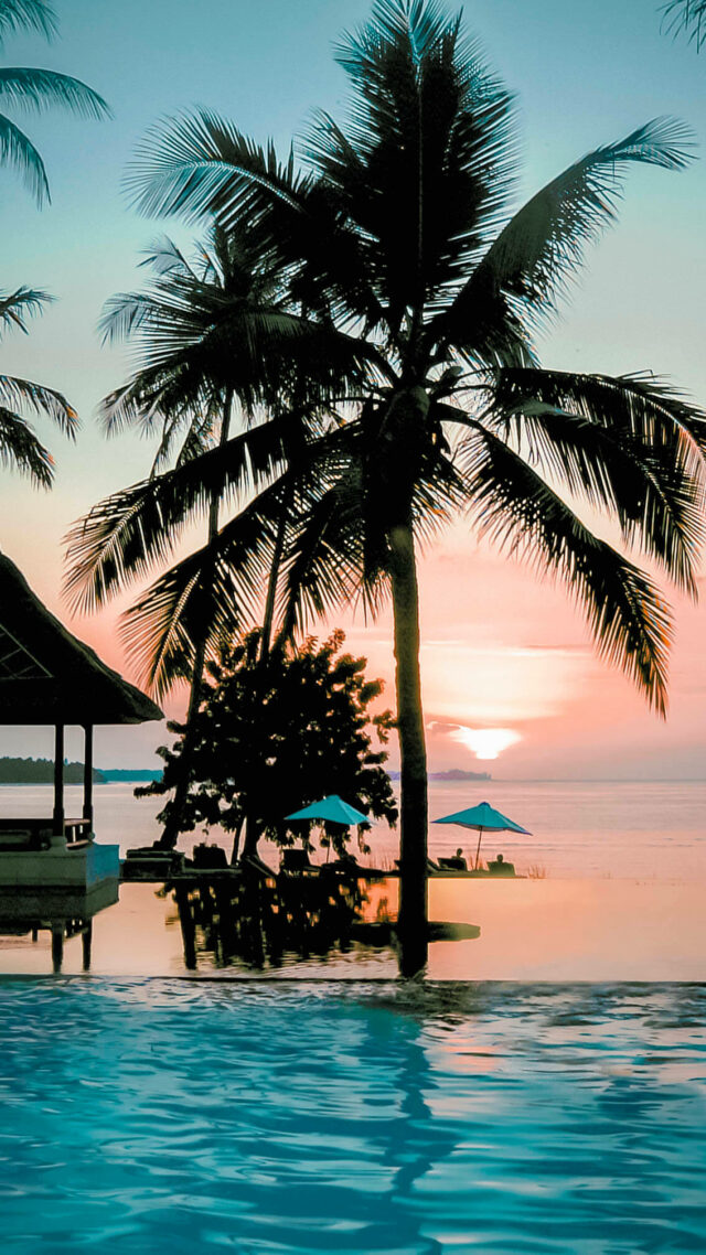 sunset pool view ocean-the oberoi beach resort lombok