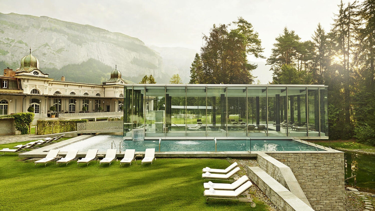 waldhaus-flims-pool-front-summer-view