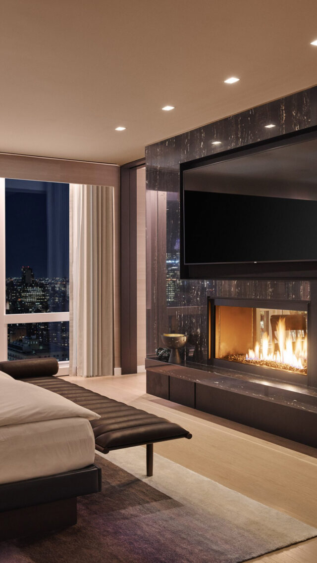equinoxsuite-bedroom-fireplace-mobile-scaled