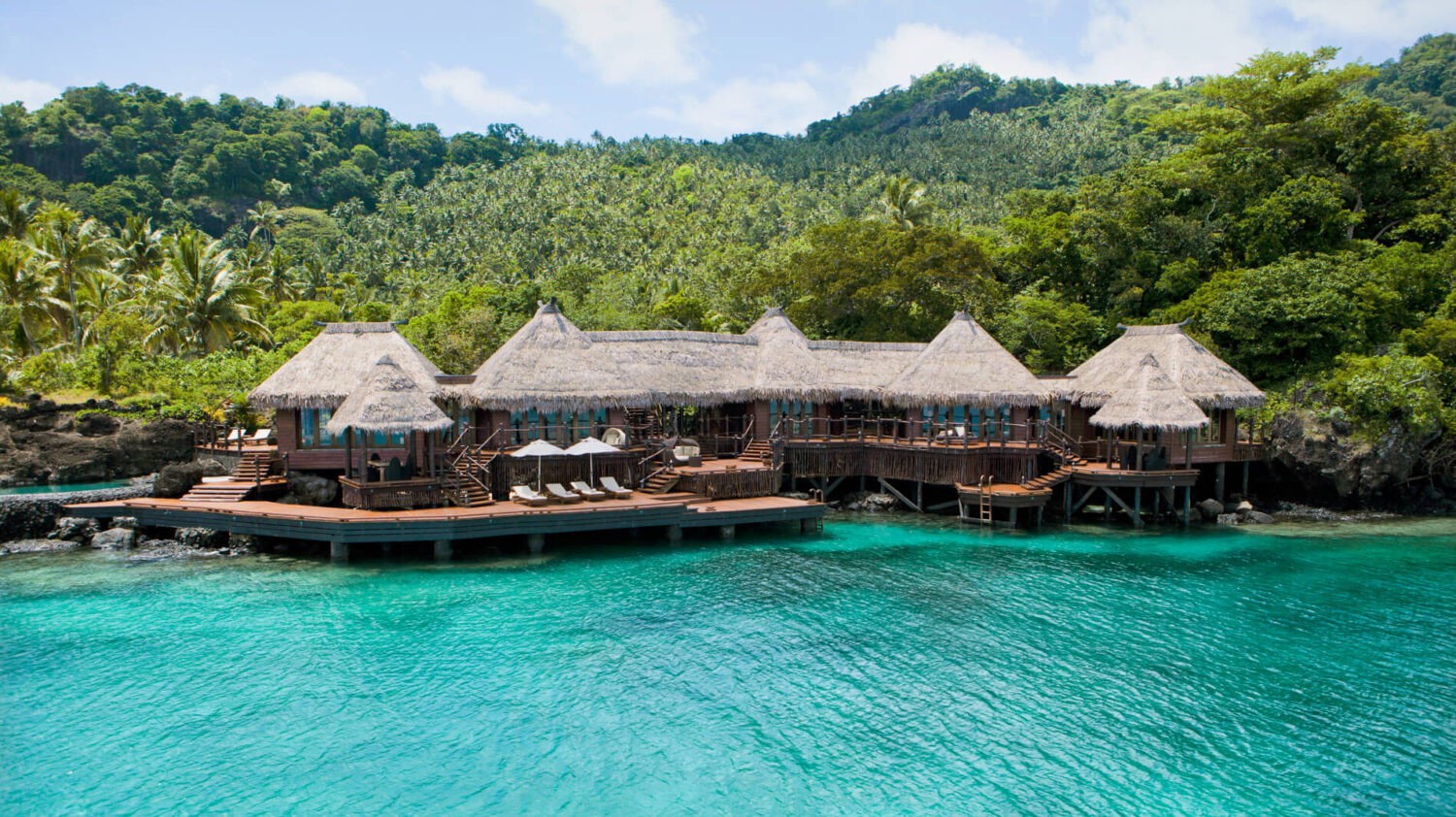 COMO_Laucala_Island_ Overwater Villa - Aerial Exterior and Pool view